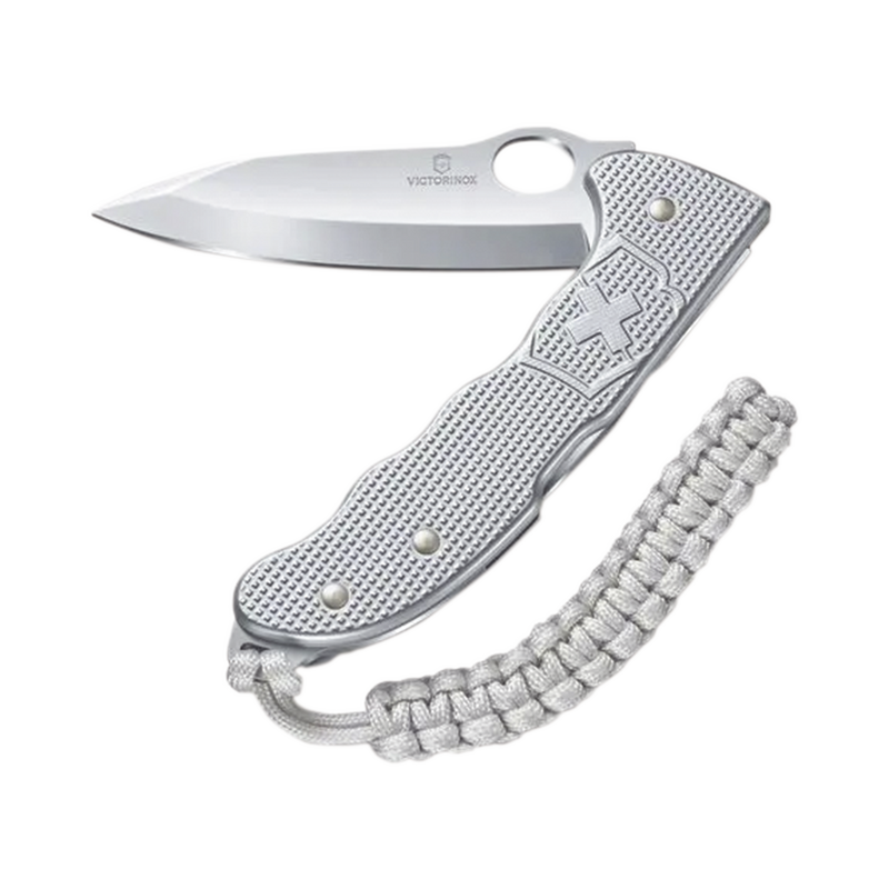 VM26 Navaja Victorinox Hunter con Cachas Alox Acanaladas y Hoja a una Mano. Con Colgante Paracord Plateado.